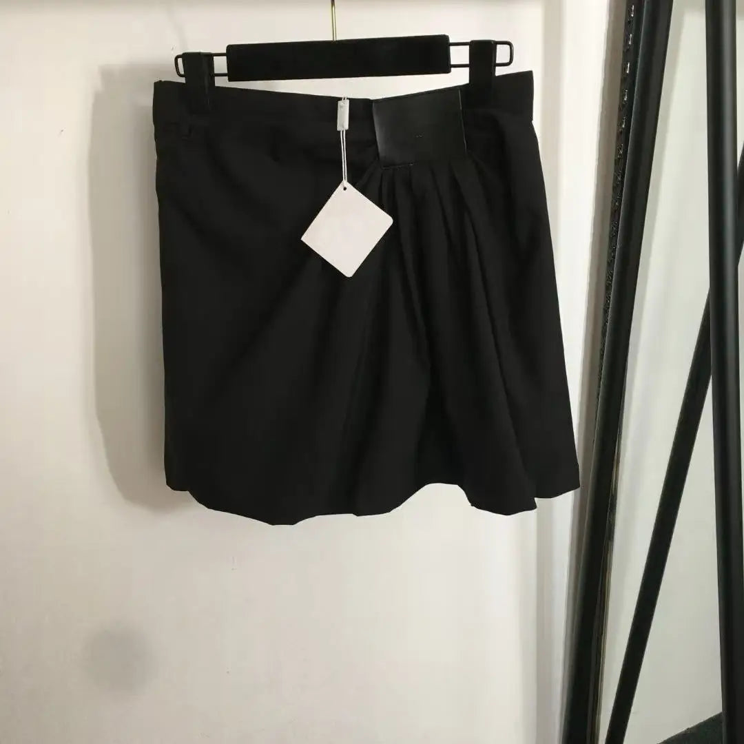 Asymmetric Pleated High-Waist Skirt — Edgy Irregular Hem in Black or Khaki — front view