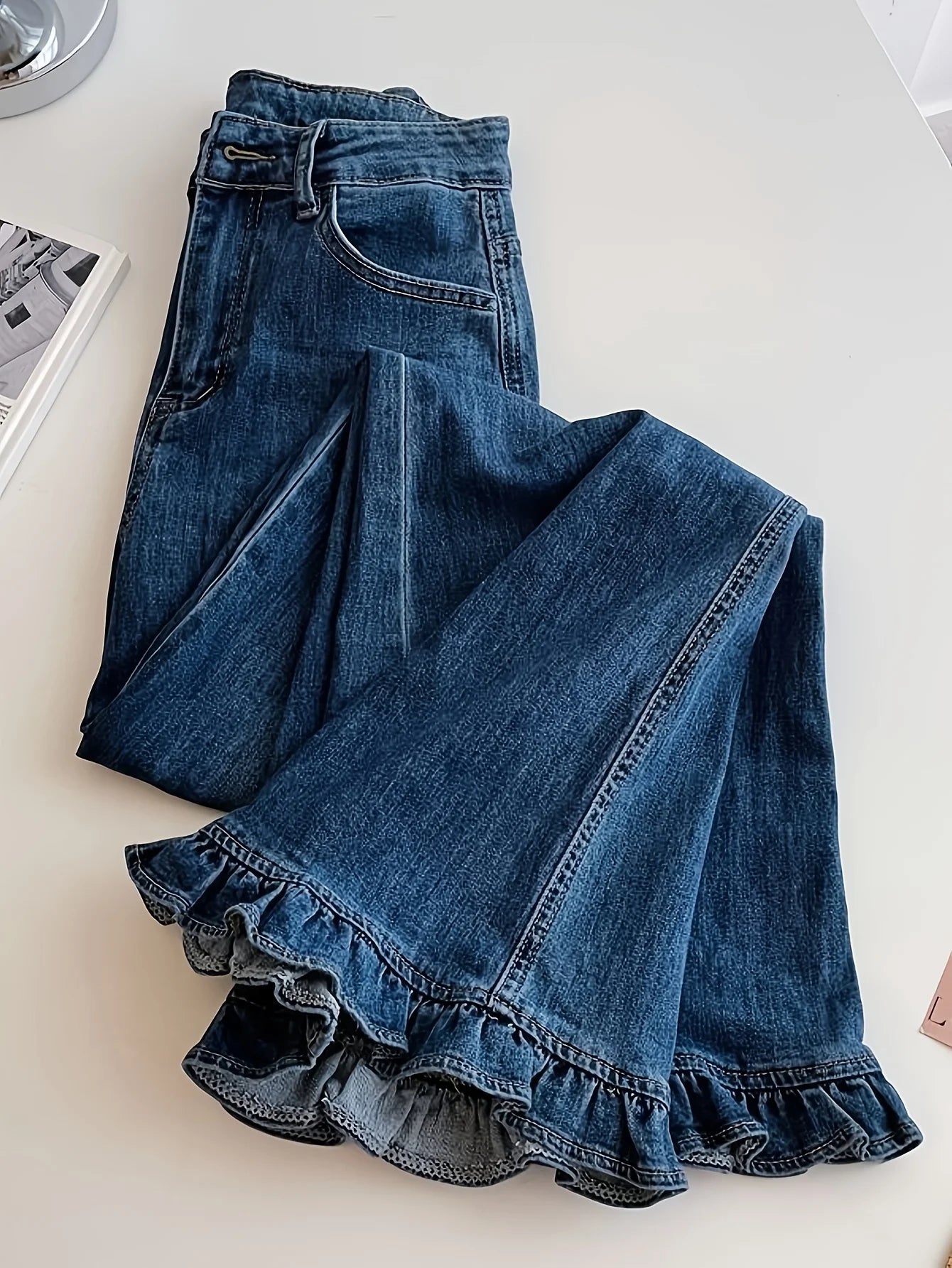Ruffle-Hem Flared Jeans — High-Waist All-Season Romantic Denim — front view