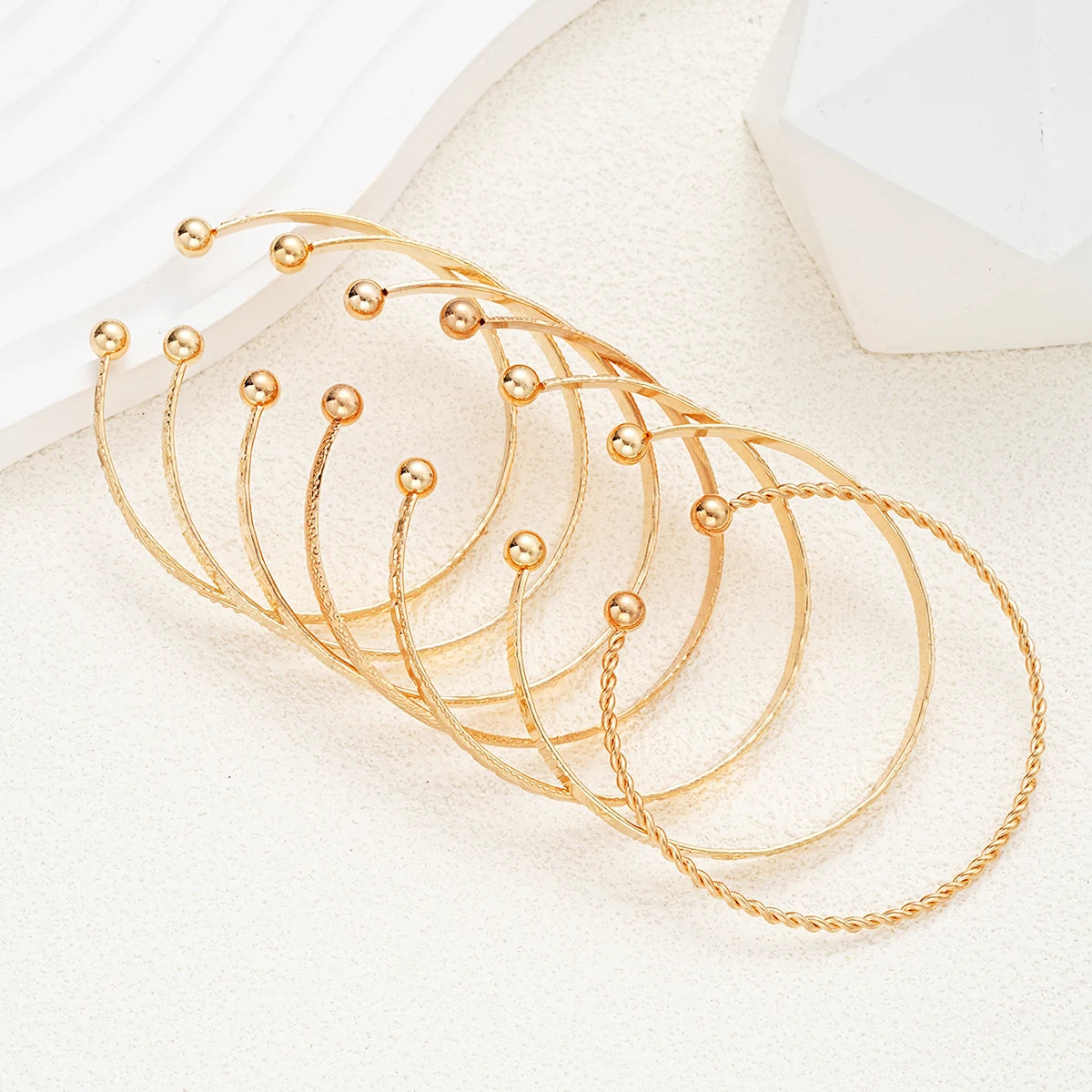 7-piece gold bangle bracelet set with heart prints for women — view 5