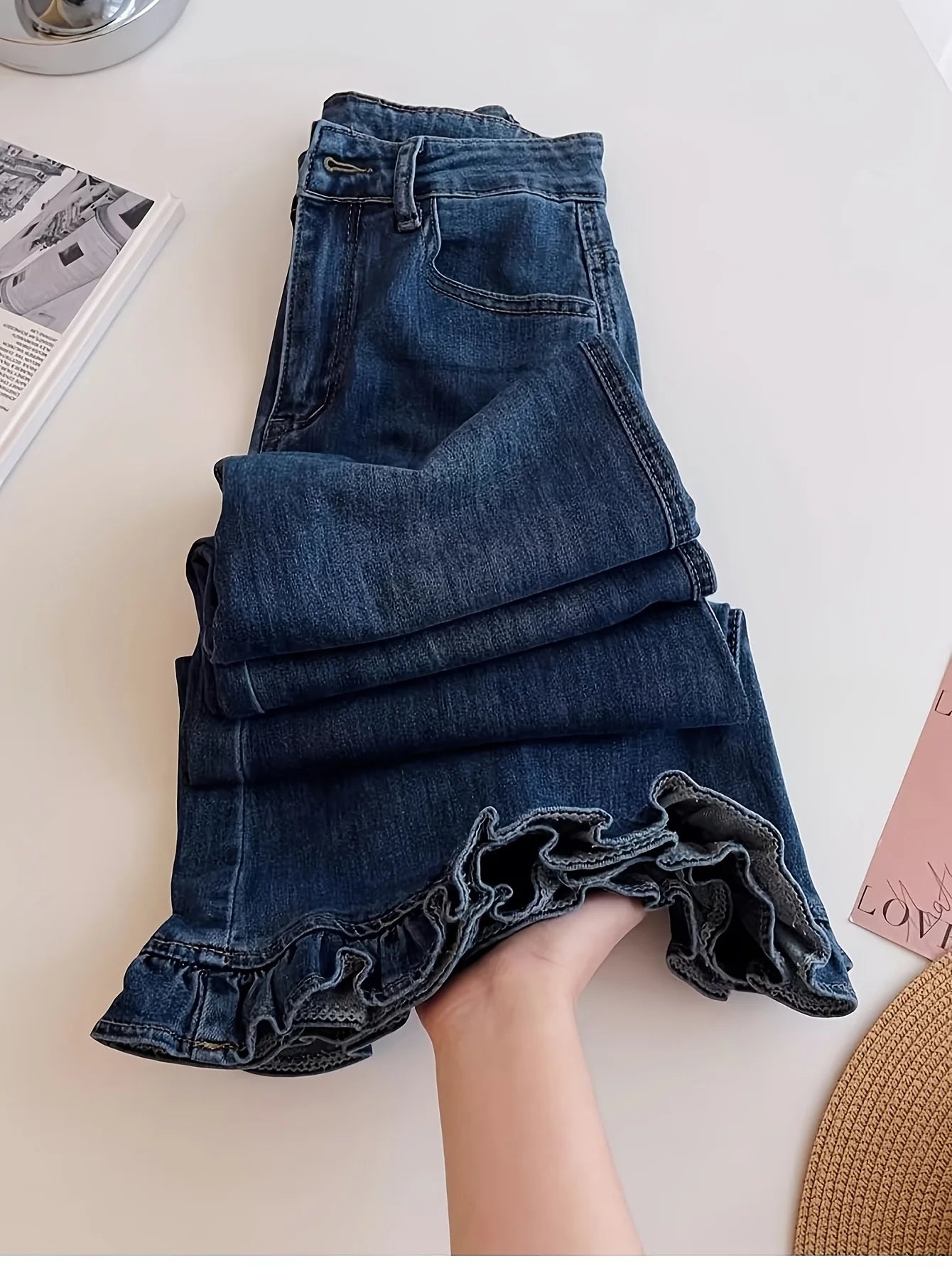 Ruffle-Hem Flared Jeans — High-Waist All-Season Romantic Denim — detail view