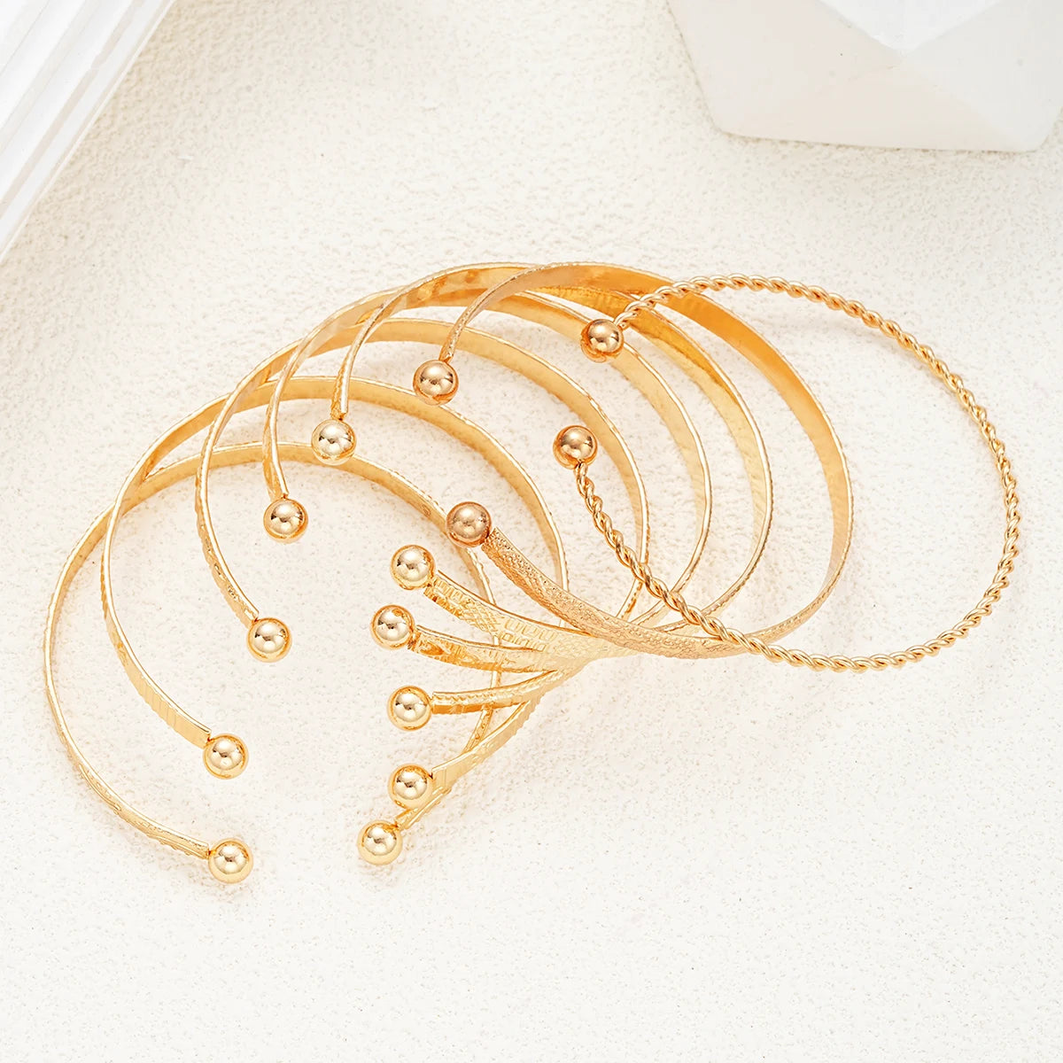 7-piece gold bangle bracelet set with heart prints for women — view 4