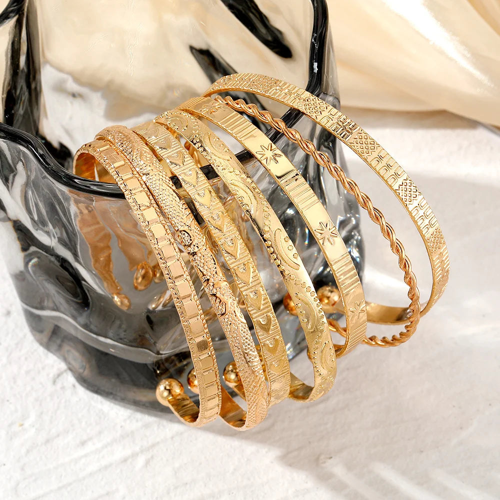 7-piece gold bangle bracelet set with heart prints for women — view 2