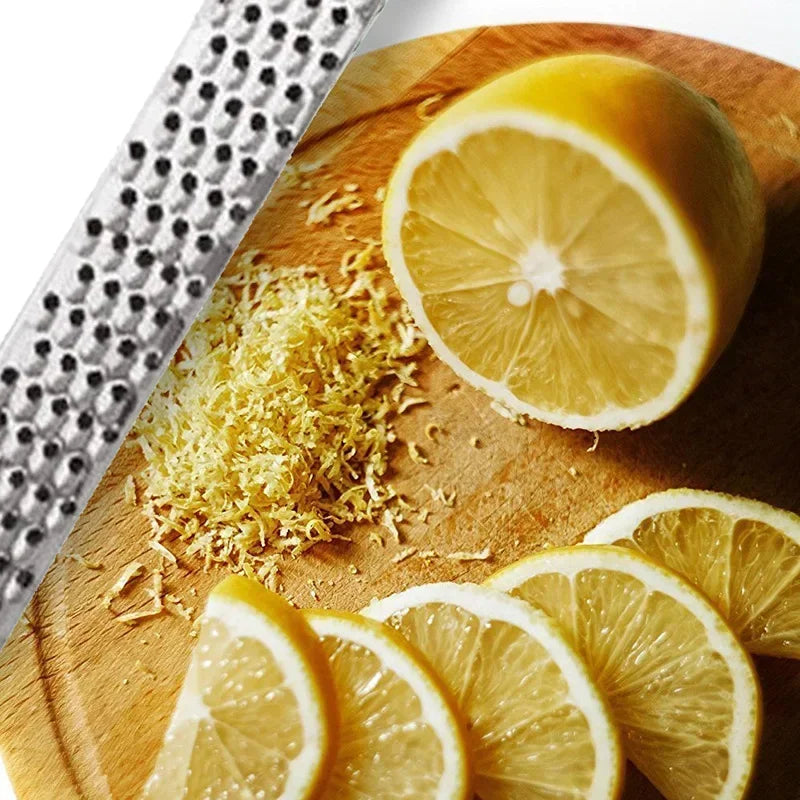 Handheld Stainless Steel Grater — Cheese, Garlic, Lemon Zester & Ginger Grinder — view 5 of kitchen gadgets