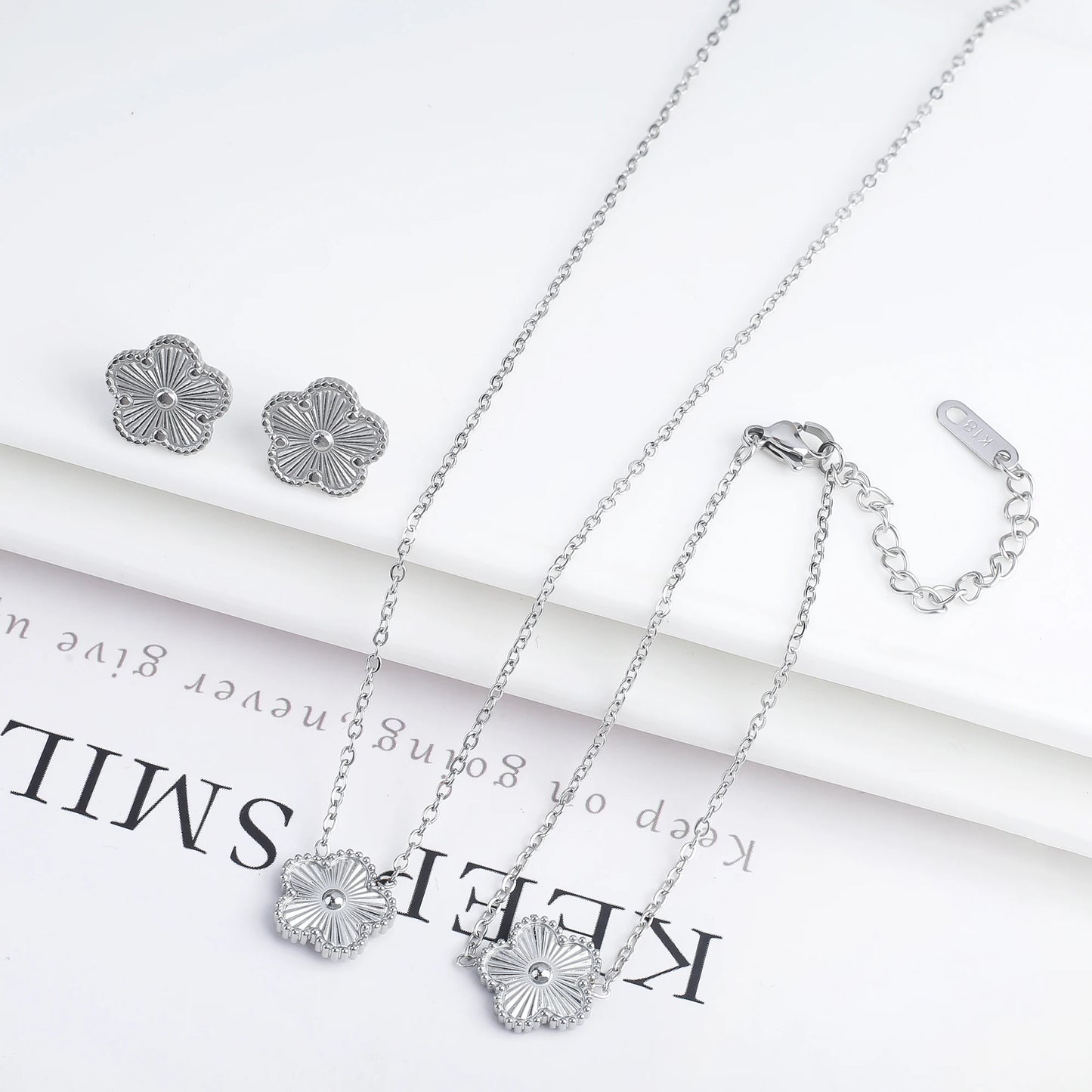 3-Piece 18K Gold-Plated Five-Leaf Flower Jewelry Set Necklace Earrings & Bracelet Clover Pendant Set — view 17 of jewelry sets