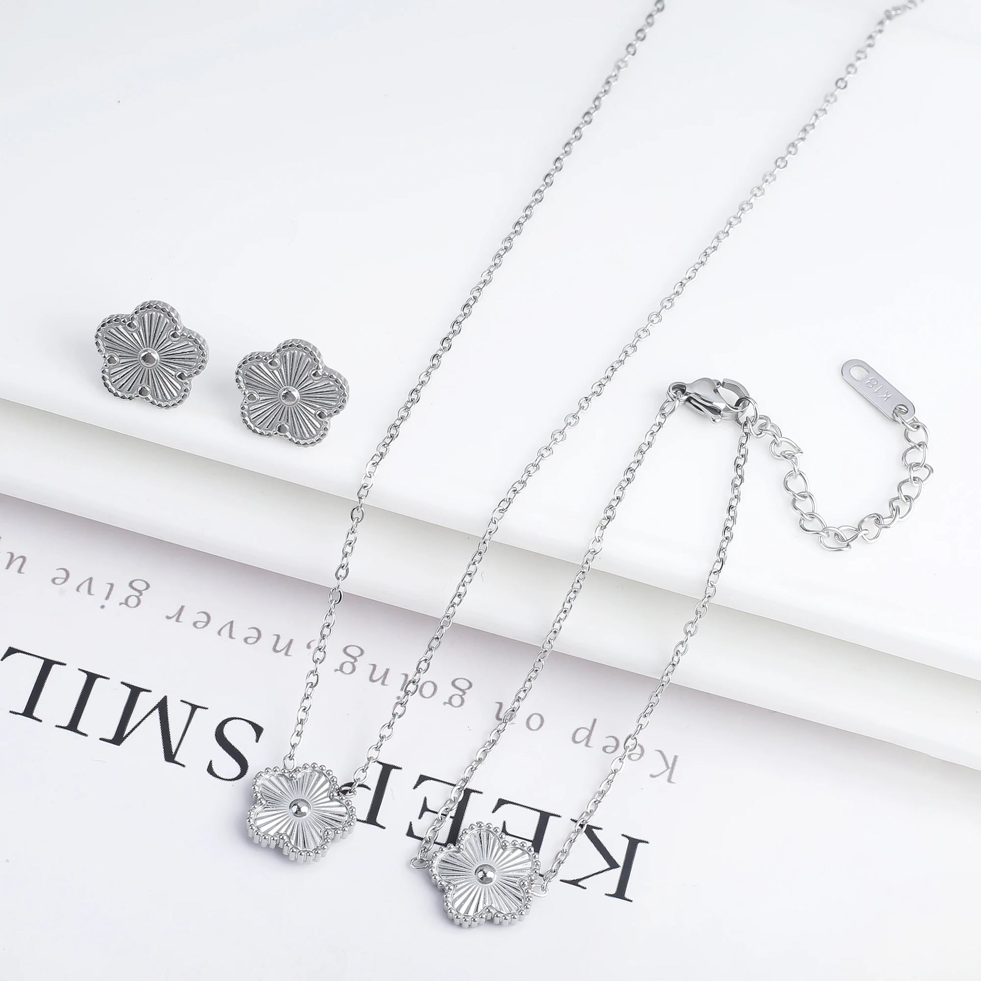 3-Piece 18K Gold-Plated Five-Leaf Flower Jewelry Set Necklace Earrings & Bracelet Clover Pendant Set — view 17 of jewelry sets