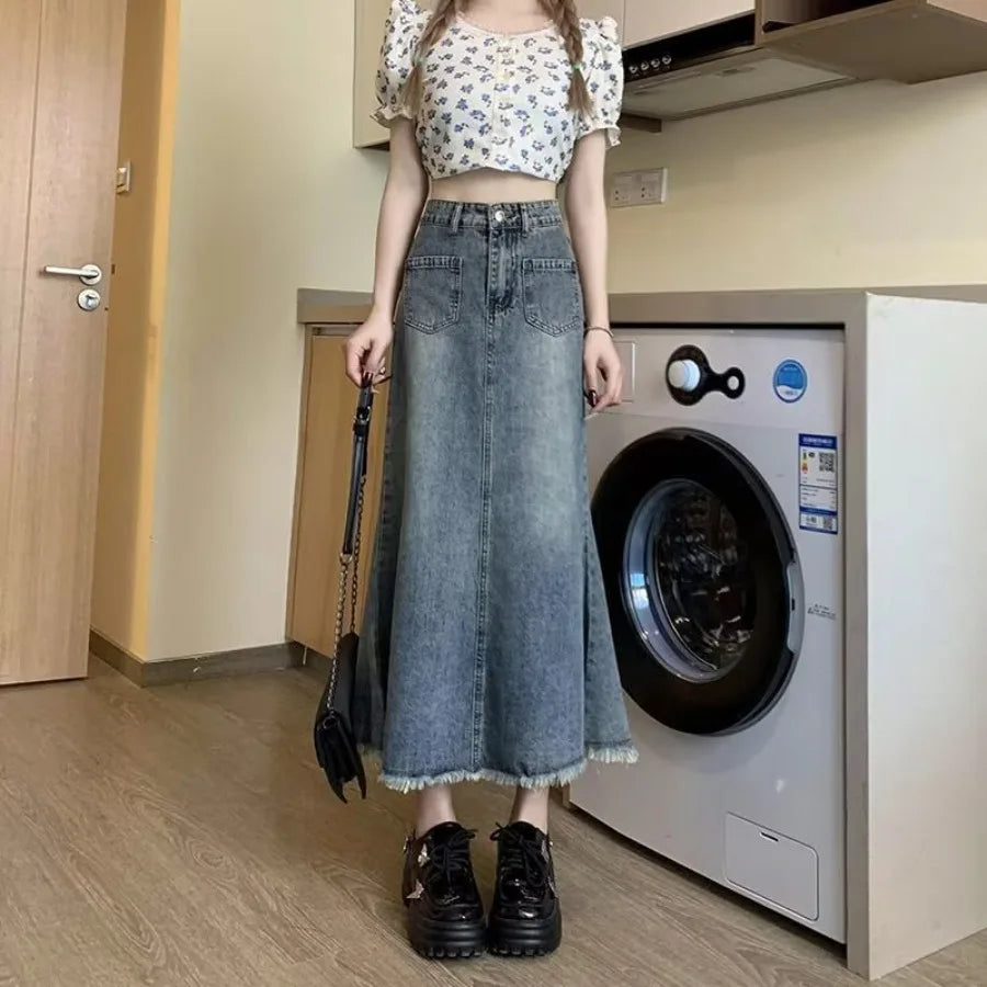 French Retro Denim Bust Skirt — High-Waist Midi with Faux-Fur Trim — front view