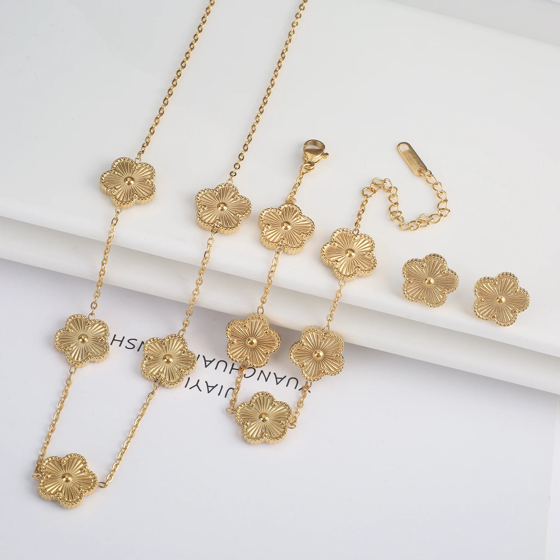 3-Piece 18K Gold-Plated Five-Leaf Flower Jewelry Set Necklace Earrings & Bracelet Clover Pendant Set — view 15 of jewelry sets