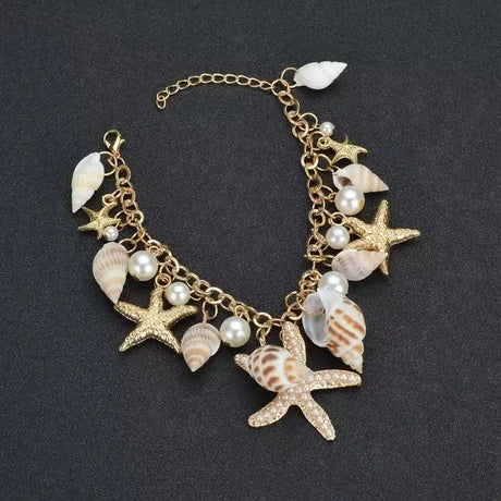 Gold Starfish & Seashell Charm Bracelet — Dainty Beach Jewelry for Women — view 1 of jewelry