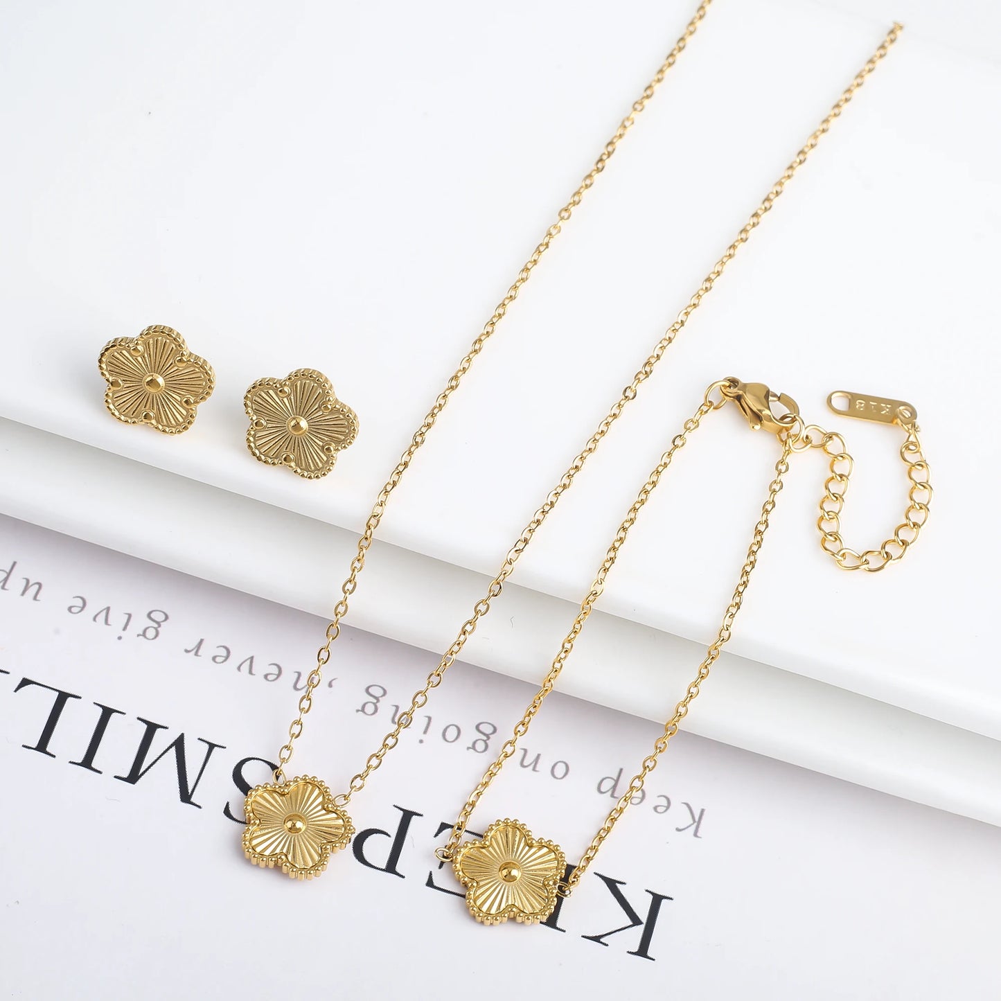 3-Piece 18K Gold-Plated Five-Leaf Flower Jewelry Set Necklace Earrings & Bracelet Clover Pendant Set — view 13 of jewelry sets