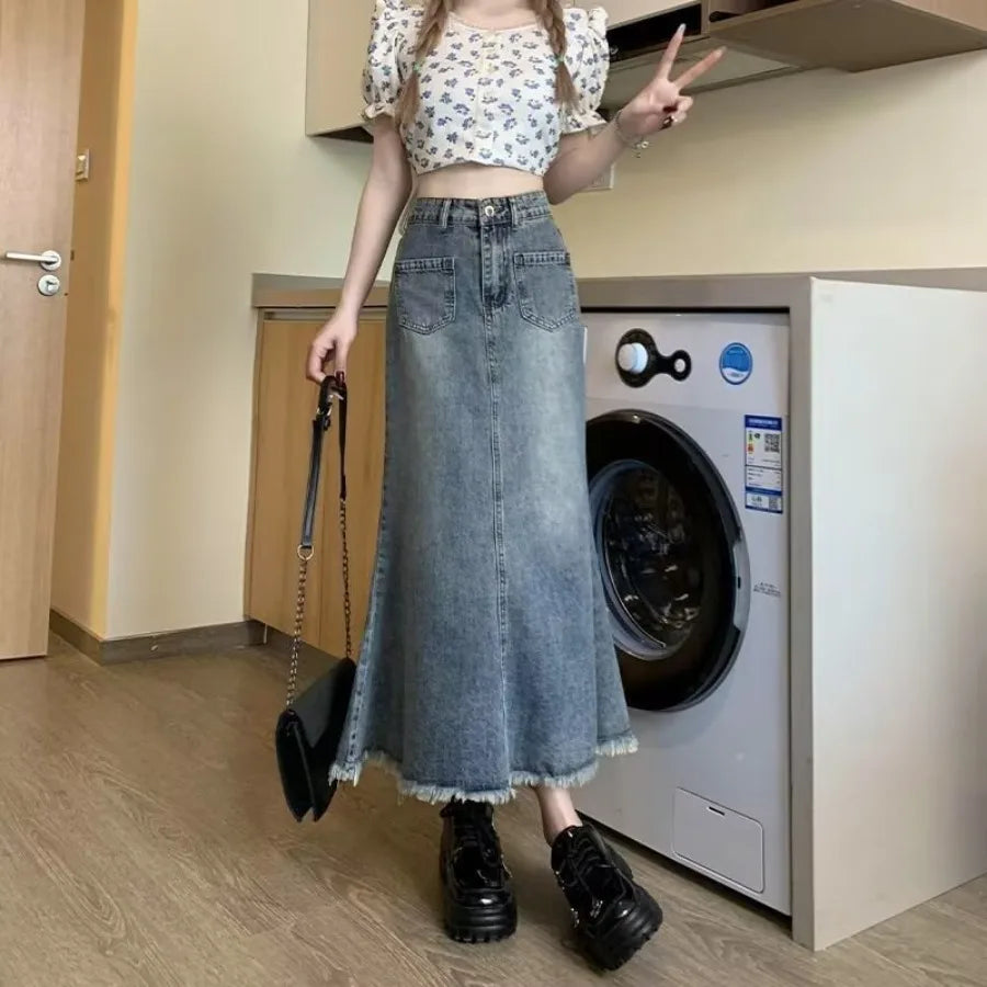 French Retro Denim Bust Skirt — High-Waist Midi with Faux-Fur Trim — back view