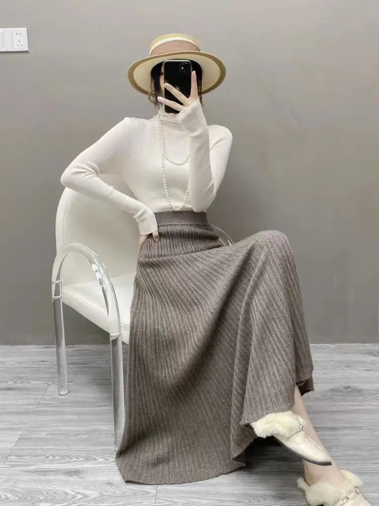 Women's medium and long-length cashmere half skirt, high-waisted, autumn and winter pleated skirt, warm A-line knitted skirt.