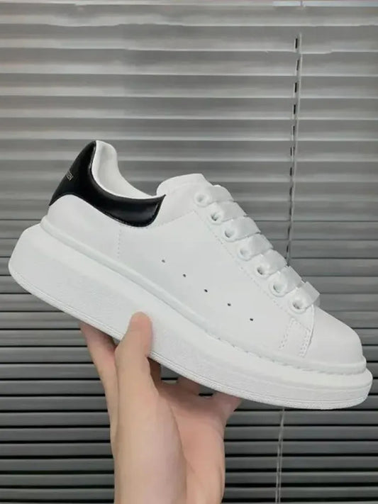 Women's White Sneakers — Elegant Skateboard Shoes with Hidden Inner Heel — view 1 of sneakers