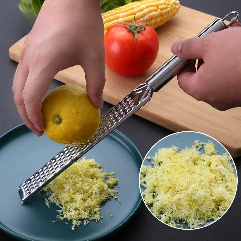 Handheld Stainless Steel Grater — Cheese, Garlic, Lemon Zester & Ginger Grinder — view 2 of kitchen gadgets
