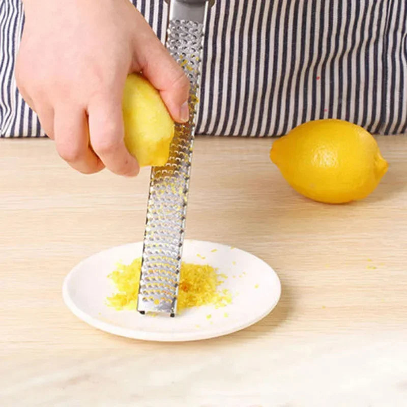 Handheld Stainless Steel Grater — Cheese, Garlic, Lemon Zester & Ginger Grinder — view 3 of kitchen gadgets